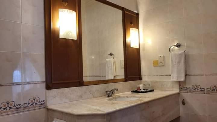 Modern bathroom sink with elegant marble countertop.